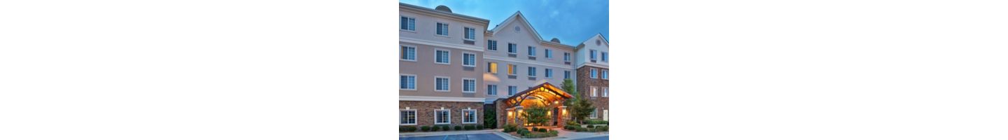Each of our king suites featuring a fully-equipped kitchen, a spacious living area, a sofa sleeper, and complimentary Wi-Fi. Additional amenities include a daily hot breakfast, complimentary onsite laundry facilities, an outdoor gazebo with a fire pit and infrared grills, on-site parking at no additional cost, and a pet-friendly property.